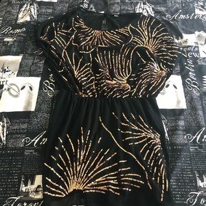 Black dress with gold sequins